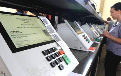 Electoral Court employees work on the final stage of sealing electronic voting machines in preparation for the 2022 general election in Brazil.