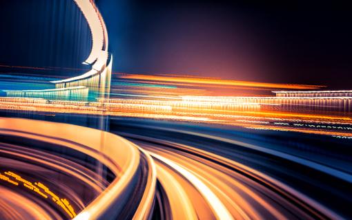 High-speed rails lit up colorfully