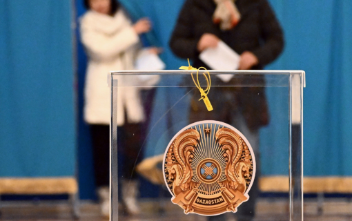 Voters during the 2022 Kazakhstan early presidential elections at polling station No. 393, in the building of the State Opera and Ballet Theater &quot;Astana Opera.&quot;