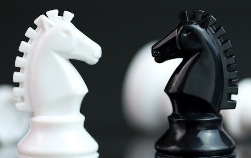 chess pieces facing each other.