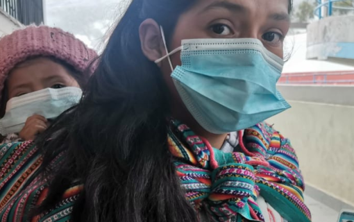 Young Indigenous woman in Peru presents voter ID
