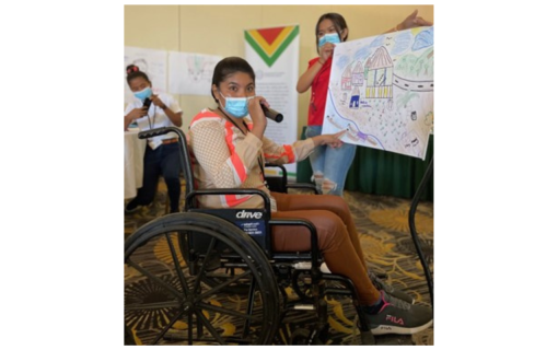 A young Indigenous woman with a disability presenting for her group during IFES’ Youth ALLIES Civic Education Training of Trainers in Guyana (March 2023).