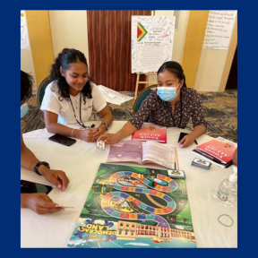 Indigenous Guyanese youth (under age 18) play a civic education board game.