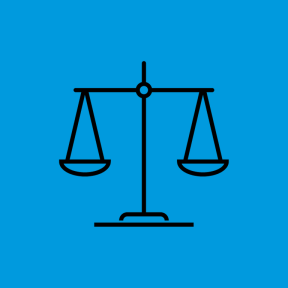 Icon of scales on blue background.