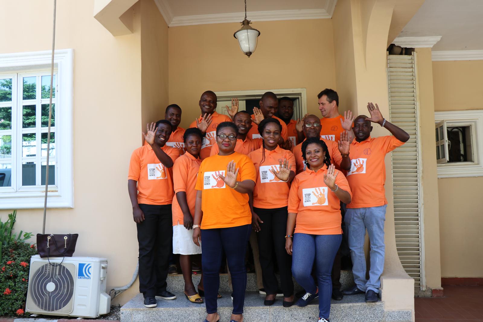 IFES Nigeria staff photographed in orange 