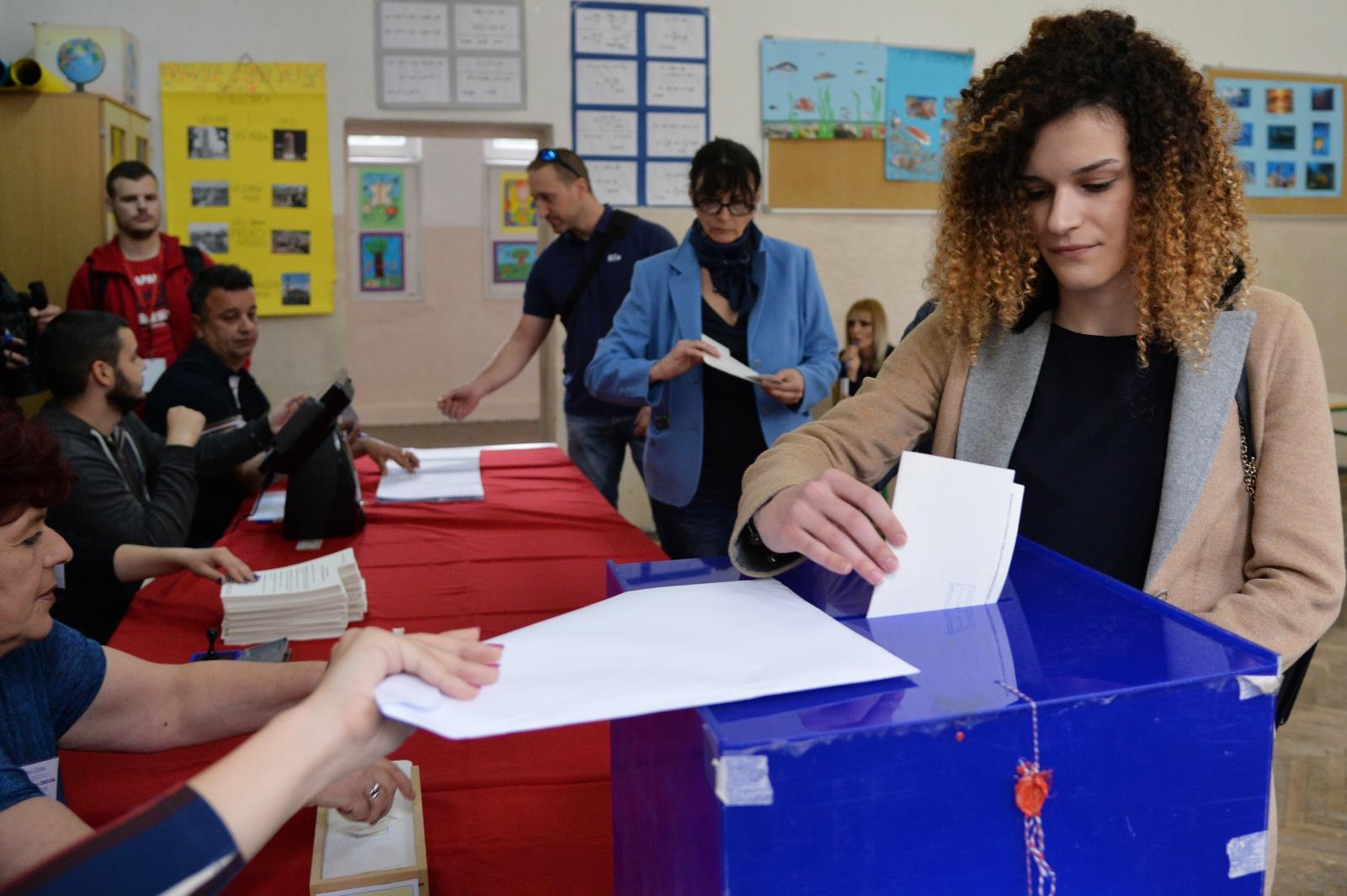A woman votes in the Montenegrin presidential election at a polling station in Podgorica.
