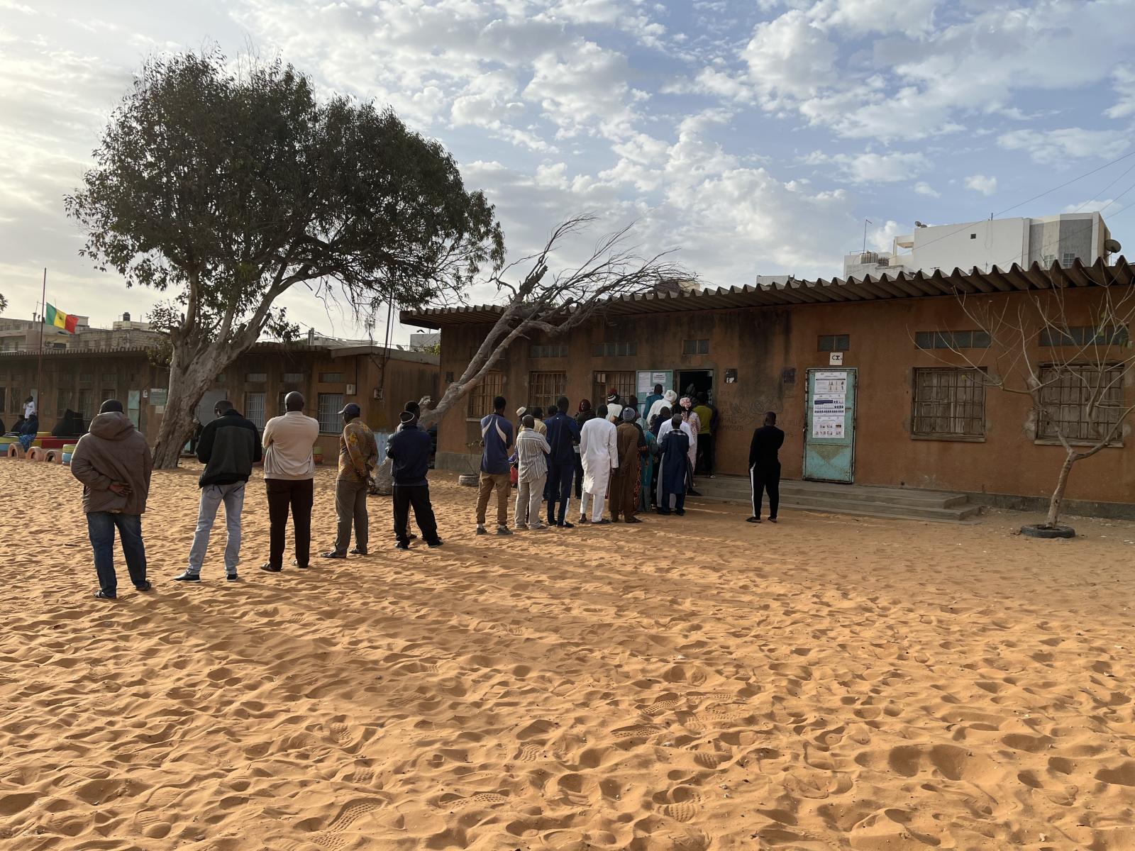  "Voters standing in line waiting their turn to vote in the 2024 Senegalese Presidential Elections. " 