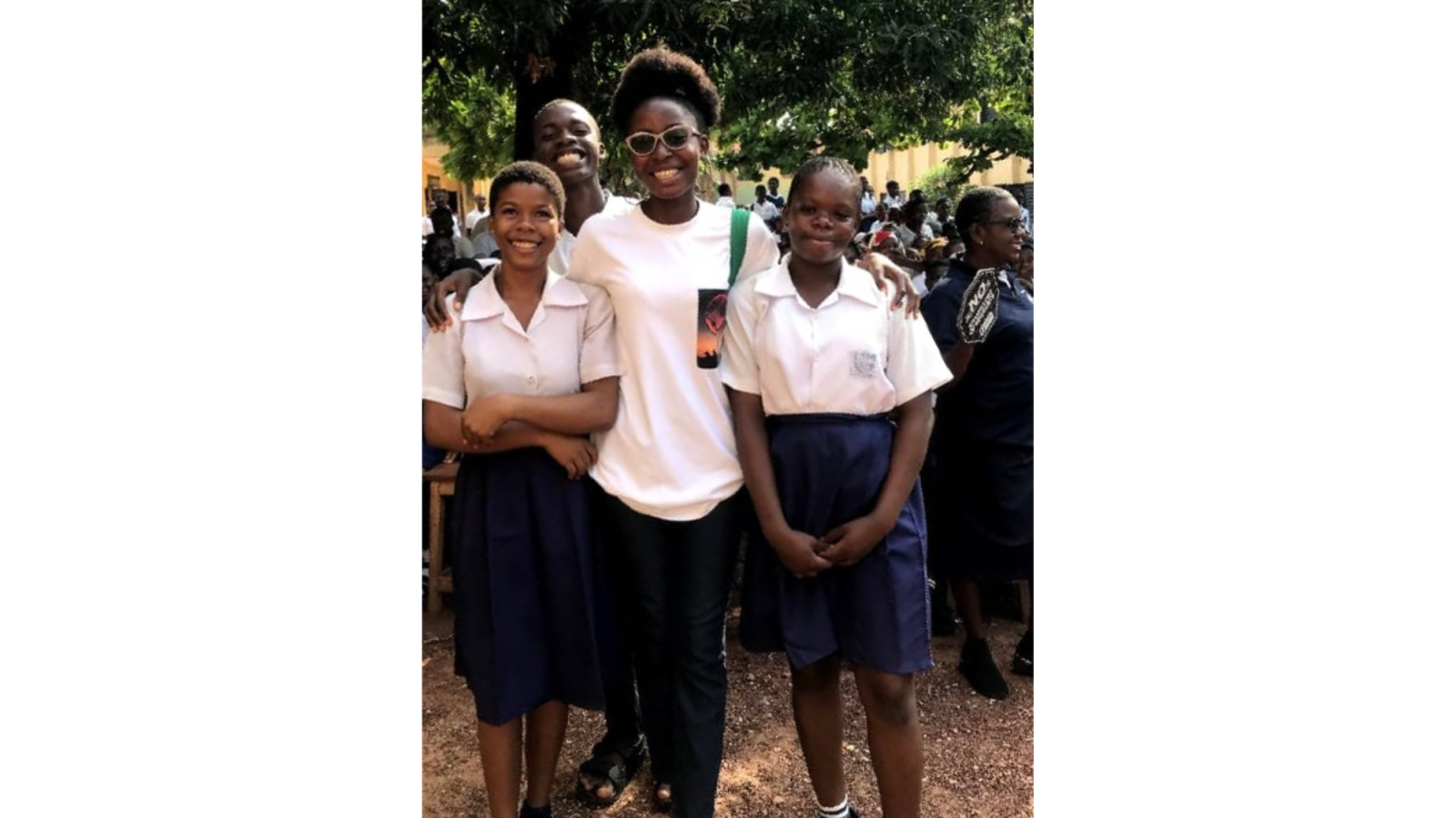 Praise with school children in uniforms. 