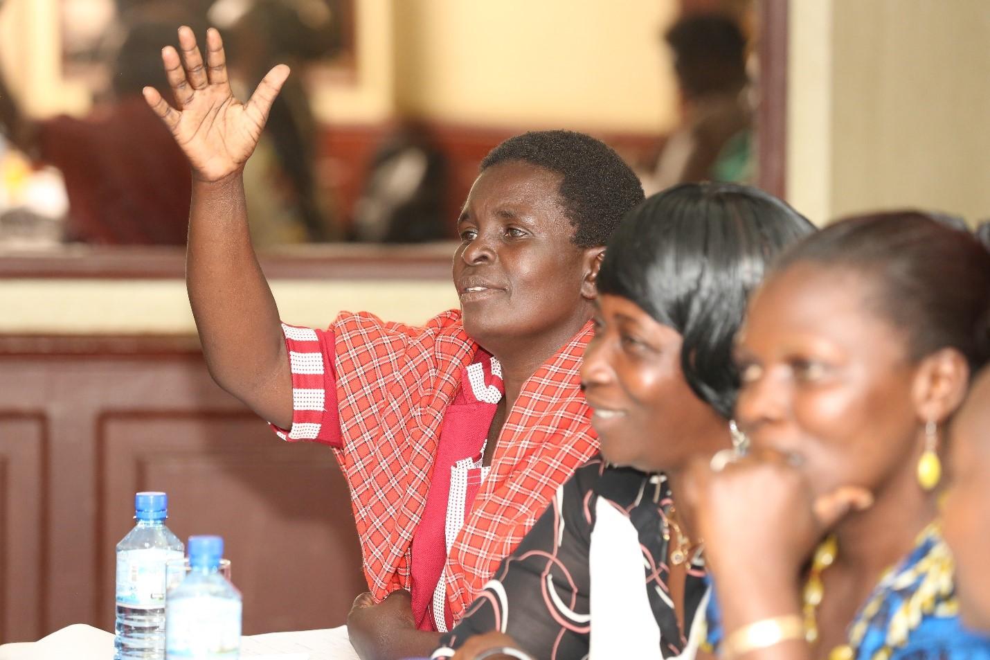 Chama women learn how to engage their local community using voter education.