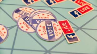 Table with vote and FBlive stickers