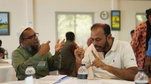 People discussing new sign language lexicon for elections in Bangladesh