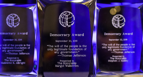 Image of Democracy Awards statues with engravings.