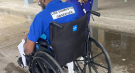 Election observer in Guyana using wheelchair 