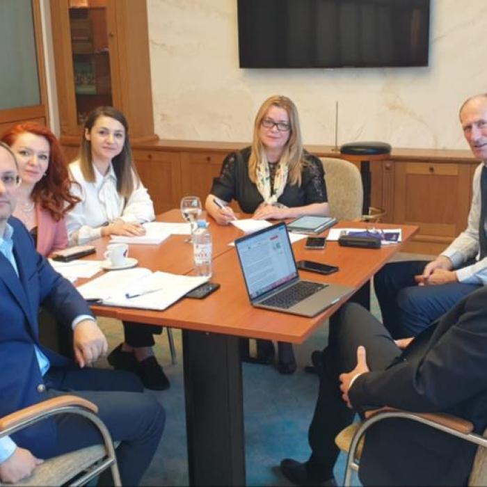 People seated at a table at European Election Justice Network 3rd Annual Meeting in Skopje, North Macedonia in 2022