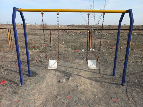 Old empty swing set in Armenia