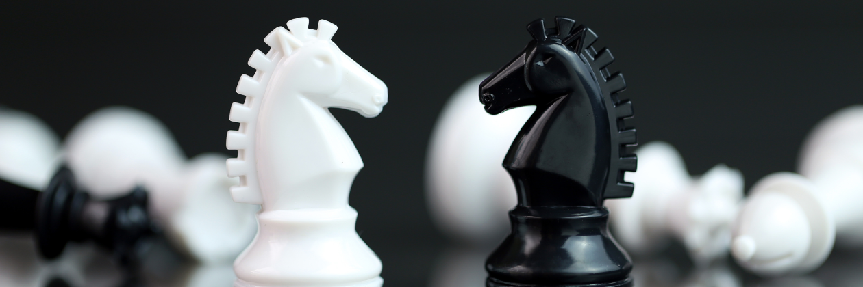 chess pieces facing each other.