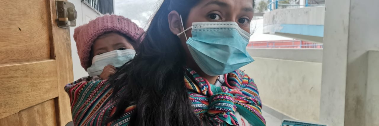 Young Indigenous woman in Peru presents voter ID