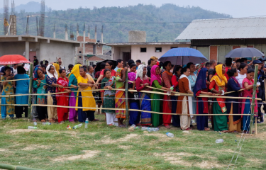 People in Nepal standing in line to vote