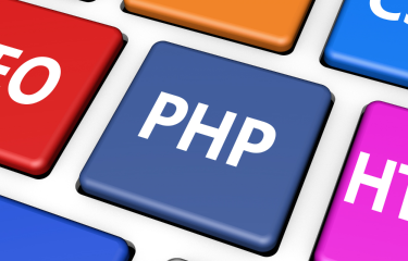 Colorful keyboard with webdesign terminology on buttons.