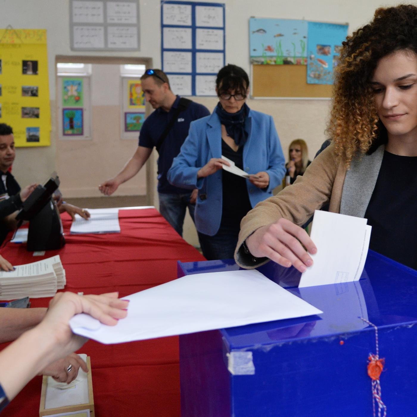 A woman votes in the Montenegrin presidential election at a polling station in Podgorica.