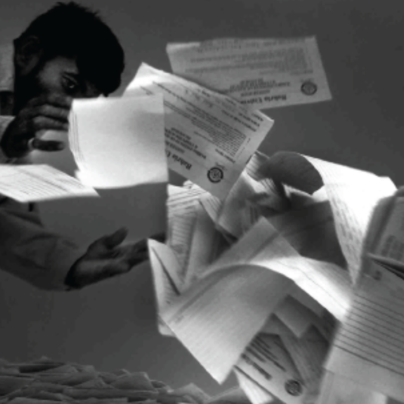 man scattering papers