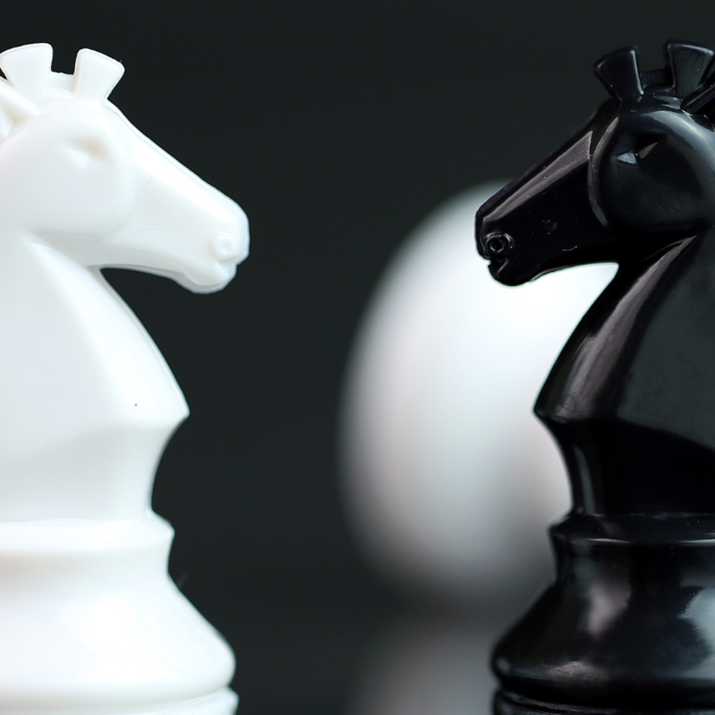 chess pieces facing each other.
