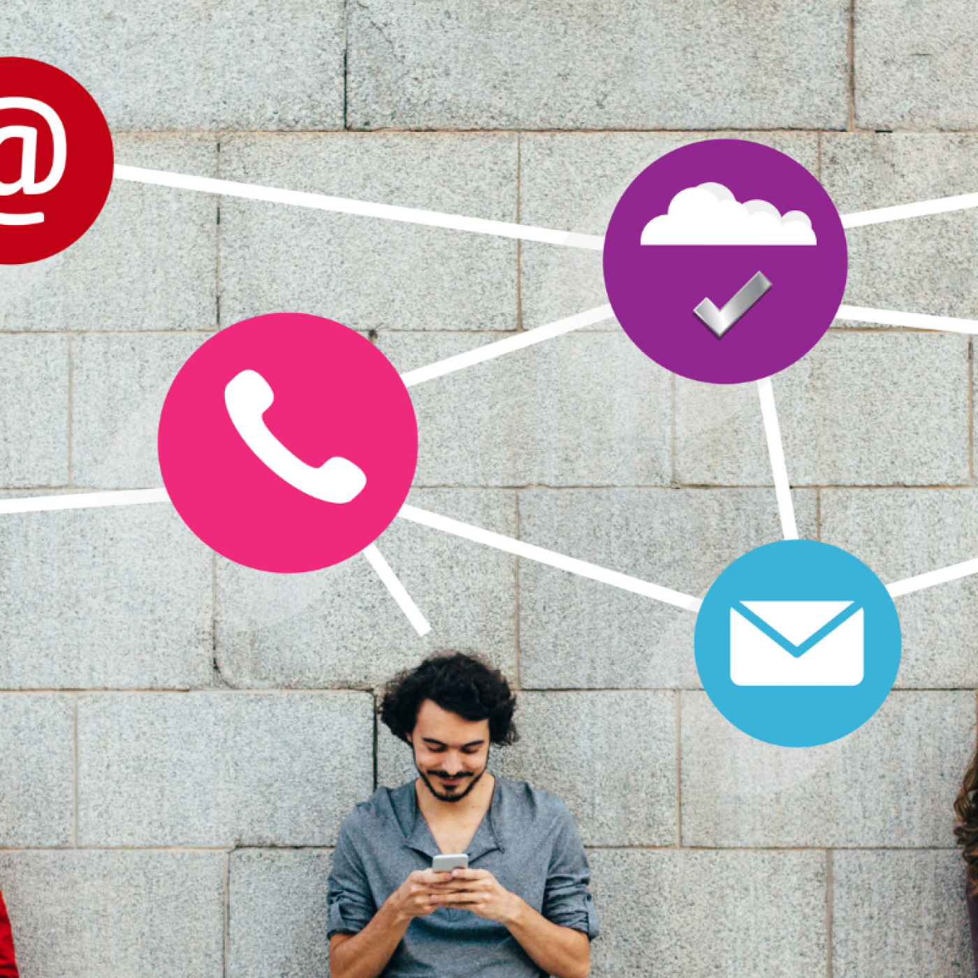 a group of people holding their phones while standing against the wall with digital icons above their heads. 