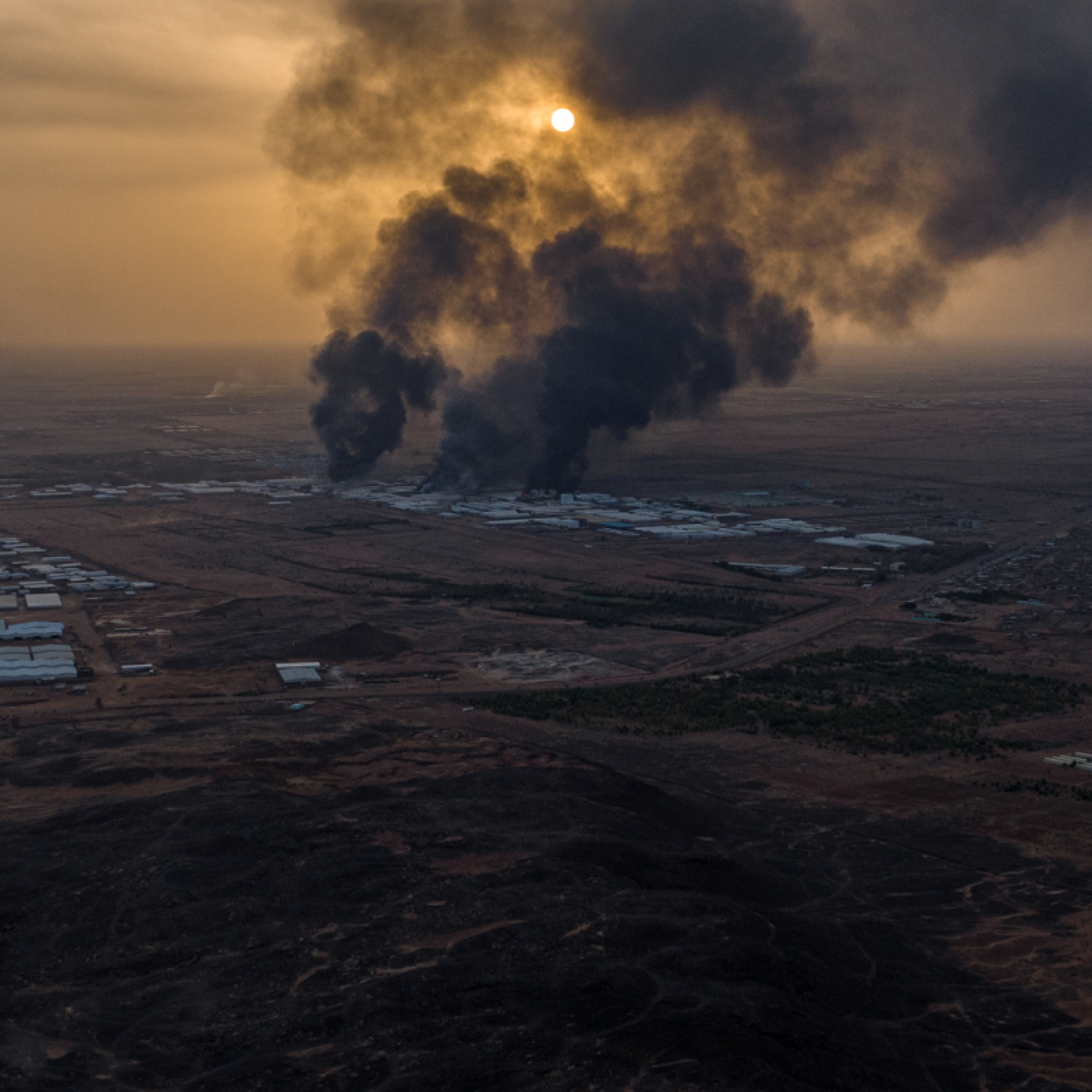 Aerial photo of widespread destruction in Sudan.